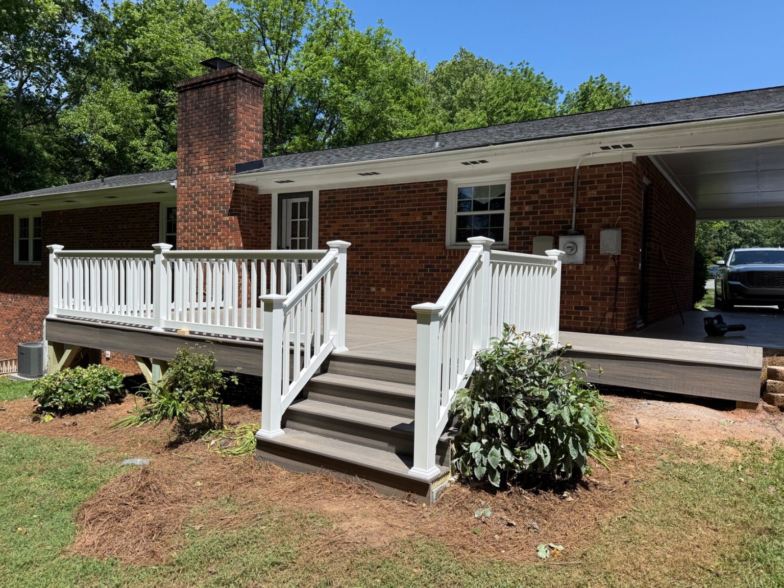 Custom Composite Deck with White Railing & Stairs
