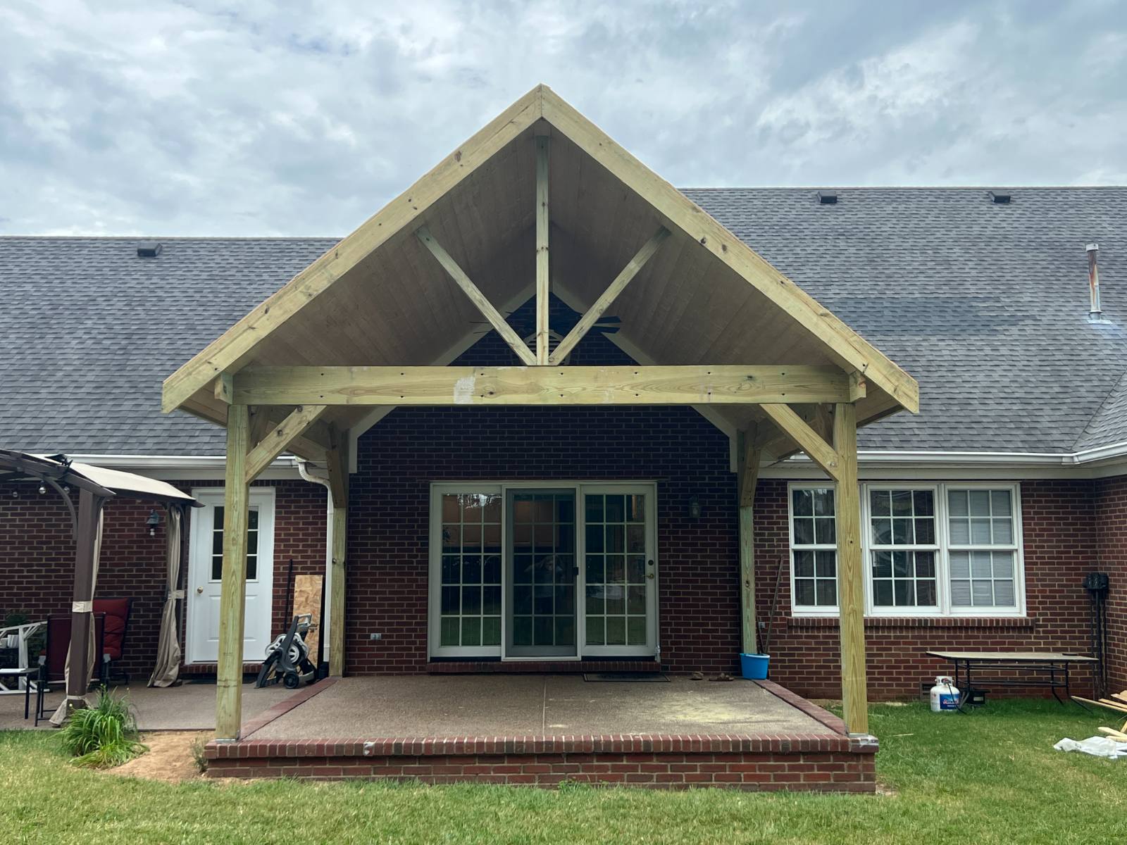 Custom Covered Patio Roof Installation - Timber Frame Outdoor Living Space