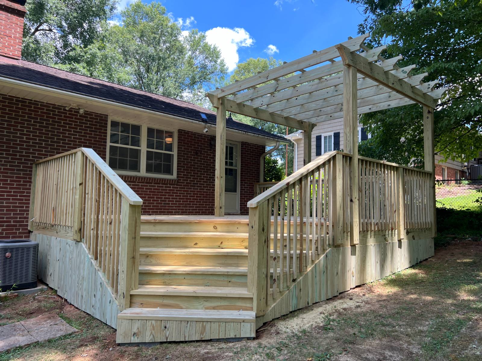 Custom Pressure-Treated Wood Deck & Pergola Installation